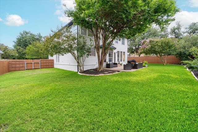 5304 China Garden Dr, Austin, TX 78730 - fenced backyard with outdoor lounge area and a patio area