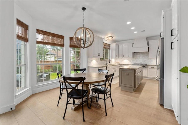 5304 China Garden Dr, Austin, TX 78730 - dining space featuring a chandelier and recessed lighting
