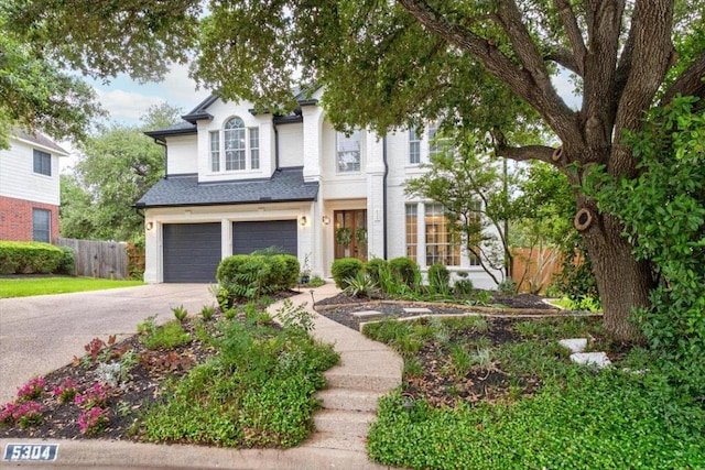 5304 China Garden Dr, Austin, TX 78730 - view of front of house with driveway and an attached garage