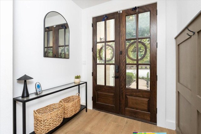 5304 China Garden Dr, Austin, TX 78730 - entryway featuring french doors and wood finished floors