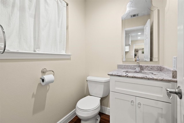 7606 Mesa Dr, Austin, TX 78731 - bathroom with vanity and wood finished floors