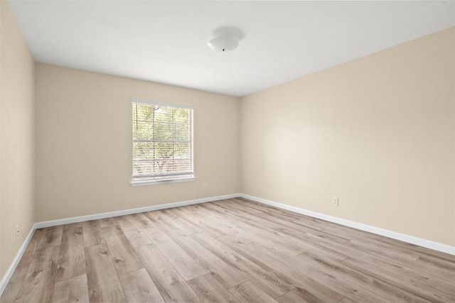 7606 Mesa Dr, Austin, TX 78731 - empty room featuring wood finished floors