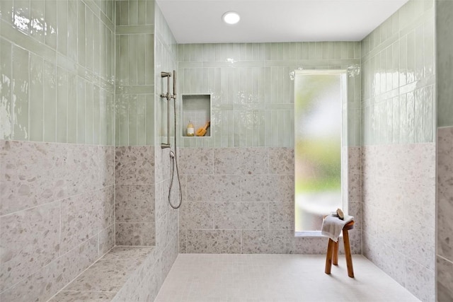 7606 Mesa Dr, Austin, TX 78731 - bathroom with a tile shower and healthy amount of natural light