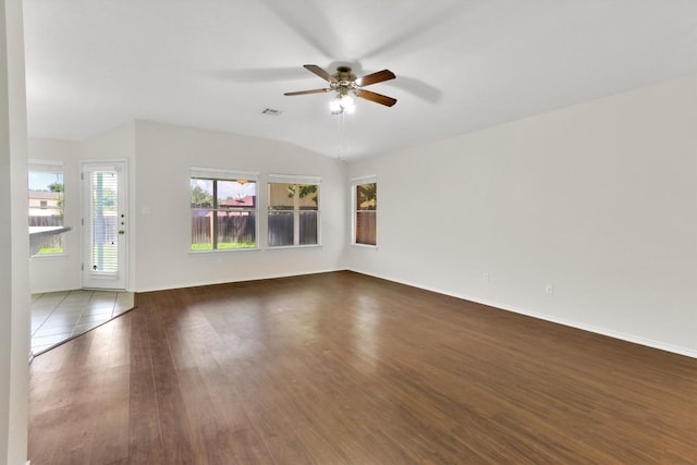 1718 Zydeco Dr, Round Rock, TX 78664 - unfurnished living room with ceiling fan, wood finished floors, and lofted ceiling