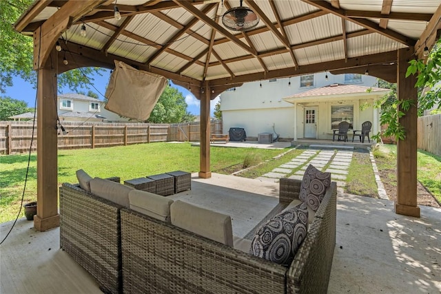 1424 Roxannes Run, Pflugerville, TX 78660 - fenced backyard with a patio area, a gazebo, and outdoor lounge area