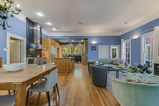 2109 Nickerson St, Austin, TX 78704 - living area with healthy amount of natural light, light wood finished floors, and recessed lighting