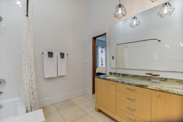 2109 Nickerson St, Austin, TX 78704 - bathroom with shower / tub combo, vanity, and tile patterned floors