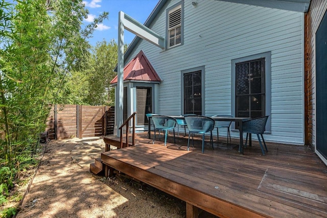 2109 Nickerson St, Austin, TX 78704 - wooden deck featuring outdoor dining area
