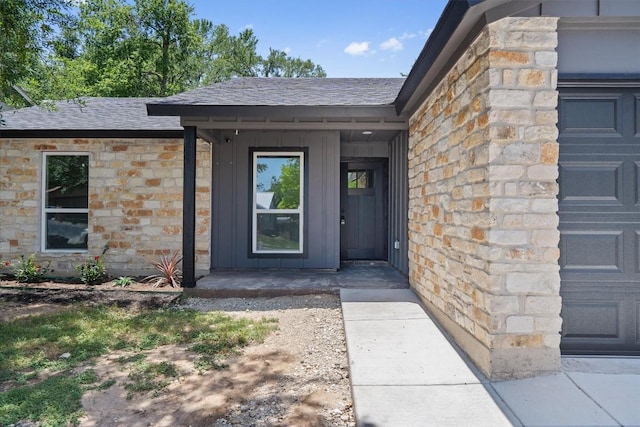 3405 Dunliegh Dr, Austin, TX 78745 - entrance to property featuring stone siding and a shingled roof