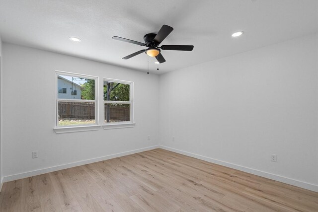 3405 Dunliegh Dr, Austin, TX 78745 - empty room with light wood-style floors, recessed lighting, and a ceiling fan