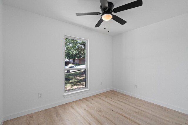 3405 Dunliegh Dr, Austin, TX 78745 - unfurnished room featuring wood finished floors and ceiling fan