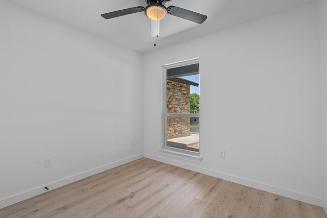 3405 Dunliegh Dr, Austin, TX 78745 - spare room with light wood-style flooring and a ceiling fan