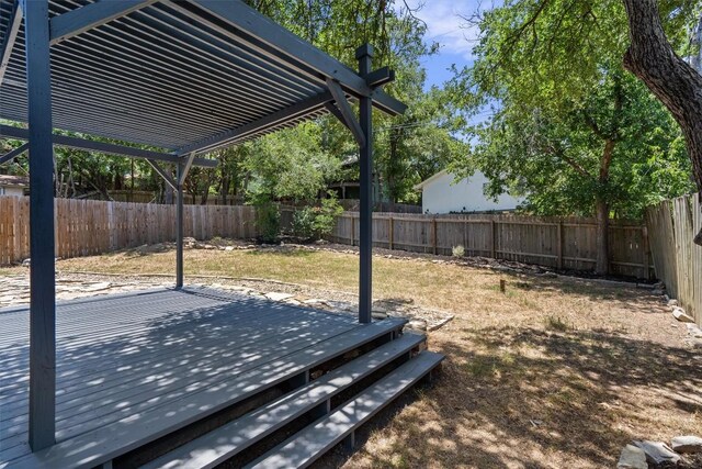 3405 Dunliegh Dr, Austin, TX 78745 - fenced backyard featuring a deck