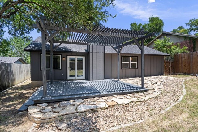 3405 Dunliegh Dr, Austin, TX 78745 - rear view of house with a pergola, a fenced backyard, and a shingled roof