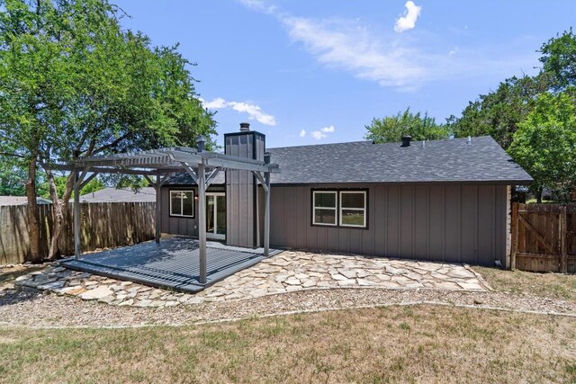 3405 Dunliegh Dr, Austin, TX 78745 - rear view of house featuring a pergola, a patio area, a fenced backyard, and a chimney