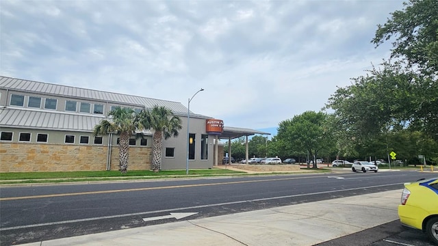 2500 Steck Ave Unit 13, Austin, TX 78757 - view of asphalt street featuring sidewalks, street lighting, curbs, and traffic signs