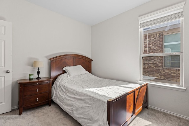 1925 T H Johnson Dr, Taylor, TX 76574 - bedroom with light carpet and baseboards