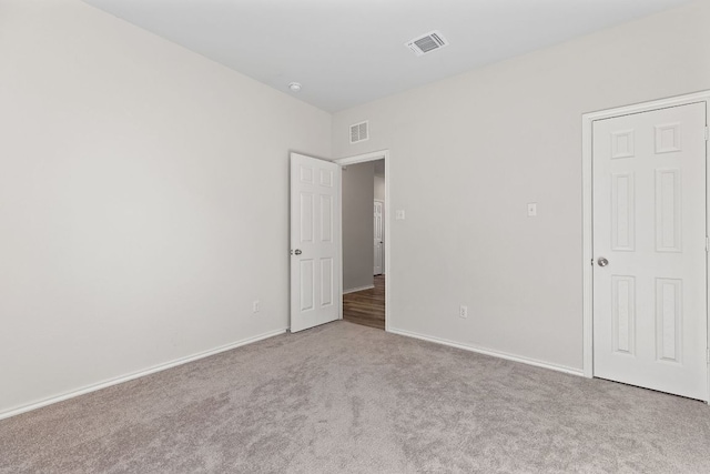 1925 T H Johnson Dr, Taylor, TX 76574 - unfurnished bedroom featuring carpet floors and baseboards