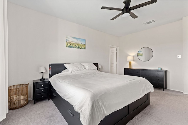 1925 T H Johnson Dr, Taylor, TX 76574 - bedroom with light colored carpet and ceiling fan