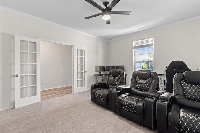 1925 T H Johnson Dr, Taylor, TX 76574 - cinema room featuring french doors, crown molding, carpet floors, and ceiling fan