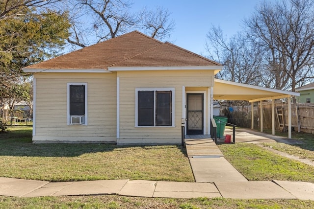 1006 Porter St, Taylor, TX 76574 - view of front facade with a carport and cooling unit