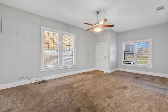 1006 Porter St, Taylor, TX 76574 - carpeted spare room with ceiling fan and baseboards