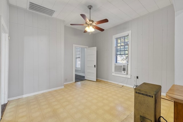 1006 Porter St, Taylor, TX 76574 - unfurnished bedroom featuring light flooring, cooling unit, and ceiling fan