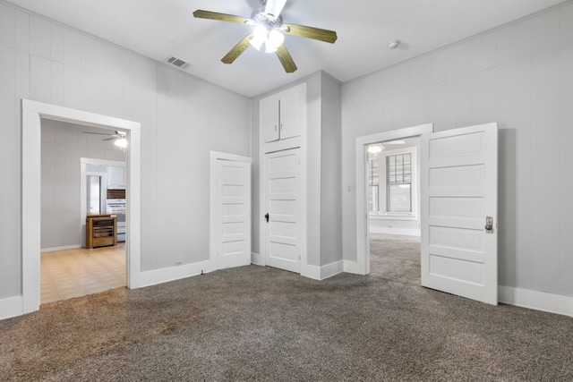1006 Porter St, Taylor, TX 76574 - unfurnished bedroom with carpet floors and a ceiling fan