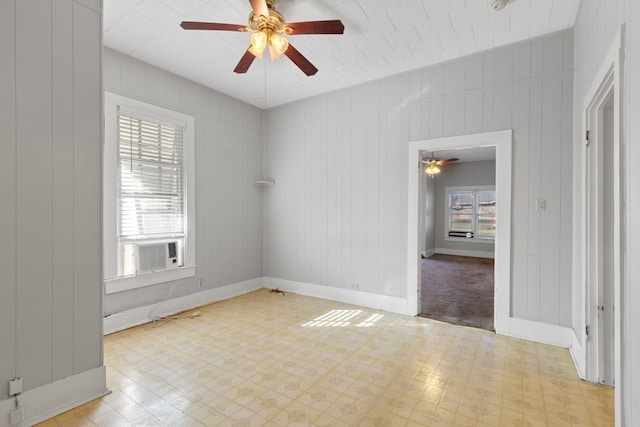1006 Porter St, Taylor, TX 76574 - spare room featuring ceiling fan, light floors, and cooling unit
