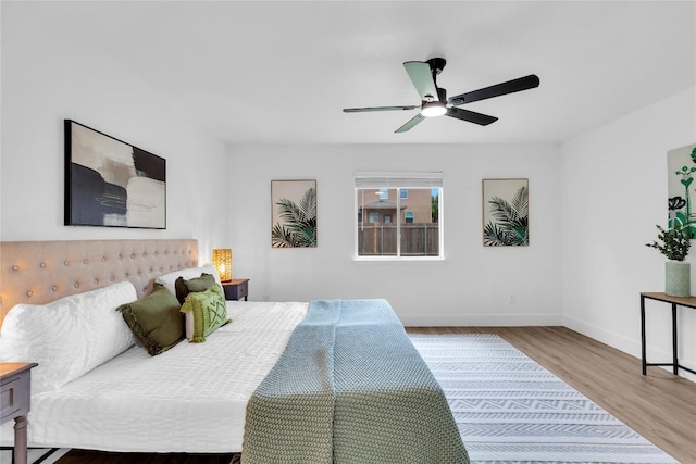 111 Woodley Rd, Leander, TX 78641 - bedroom featuring wood finished floors and ceiling fan
