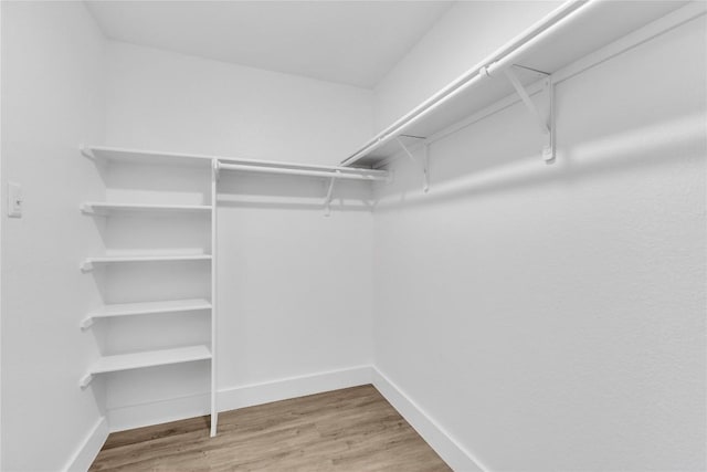 111 Woodley Rd, Leander, TX 78641 - spacious closet with wood finished floors