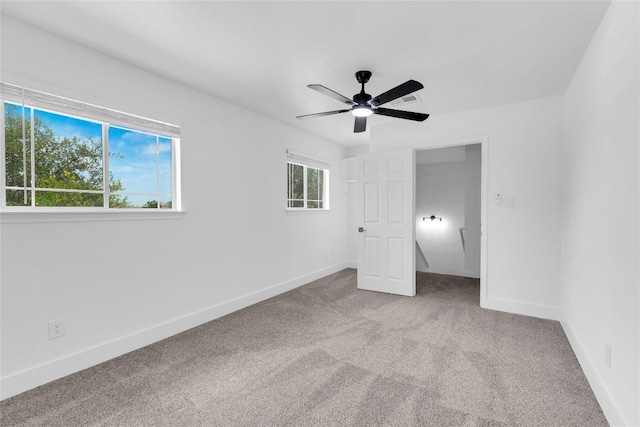 111 Woodley Rd, Leander, TX 78641 - unfurnished bedroom with carpet floors and a ceiling fan