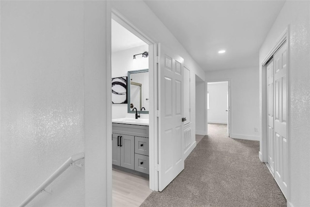 111 Woodley Rd, Leander, TX 78641 - corridor with light colored carpet and recessed lighting