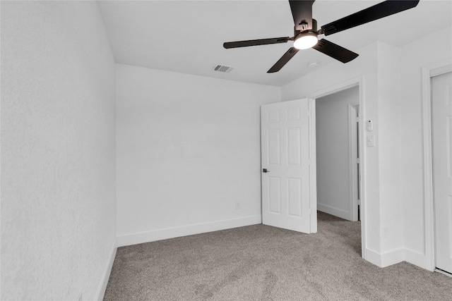 111 Woodley Rd, Leander, TX 78641 - unfurnished bedroom with carpet and a ceiling fan