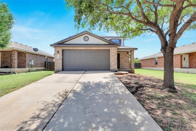 111 Woodley Rd, Leander, TX 78641 - view of front facade featuring brick siding, concrete driveway, and a garage