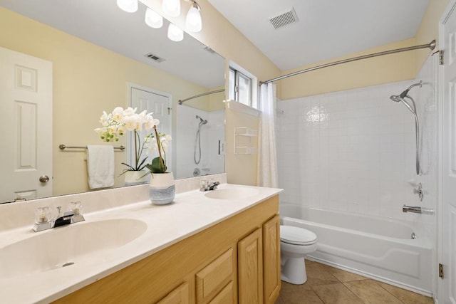 8204 Ito Cv, Austin, TX 78729 - bathroom with shower / bath combo, double vanity, and tile patterned floors