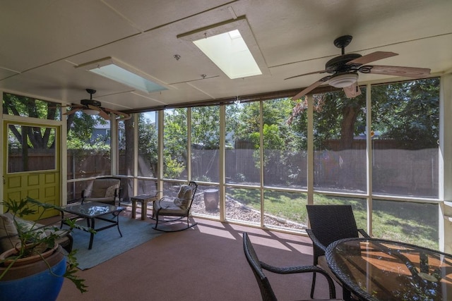 8204 Ito Cv, Austin, TX 78729 - sunroom / solarium featuring a skylight, a ceiling fan, and healthy amount of natural light