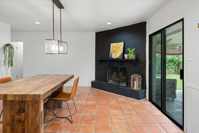 8102 Shadowood Dr, Austin, TX 78757 - dining area featuring recessed lighting and a brick fireplace