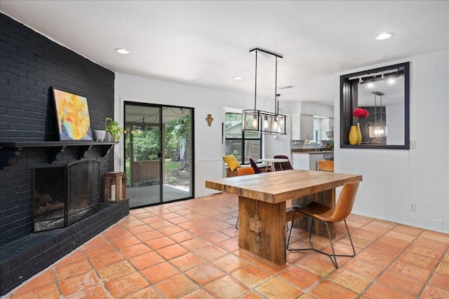 8102 Shadowood Dr, Austin, TX 78757 - dining room featuring recessed lighting and a fireplace