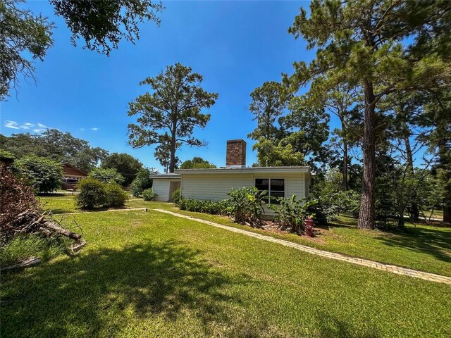407 4th Ave, Smithville, TX 78957 - view of green lawn