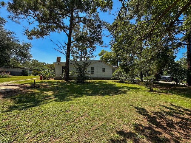 407 4th Ave, Smithville, TX 78957 - view of green lawn