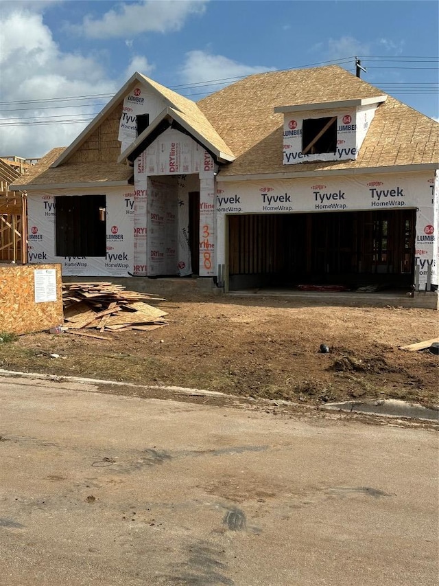 348 Ridgewell Loop, Georgetown, TX 78633 - property in mid-construction featuring a garage and a shingled roof