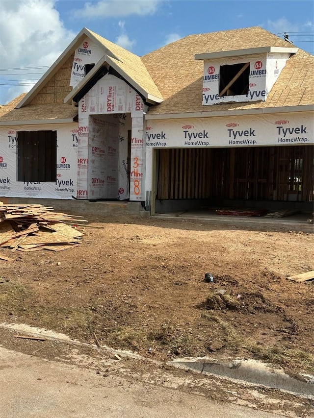 348 Ridgewell Loop, Georgetown, TX 78633 - view of front of property featuring roof with shingles