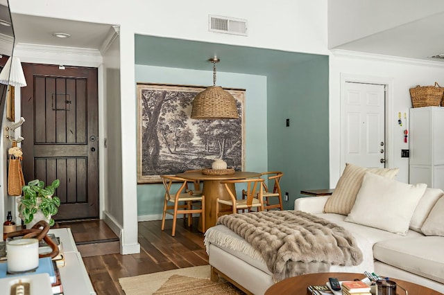7303 Lunar Dr, Austin, TX 78745 - living area featuring ornamental molding and wood finished floors