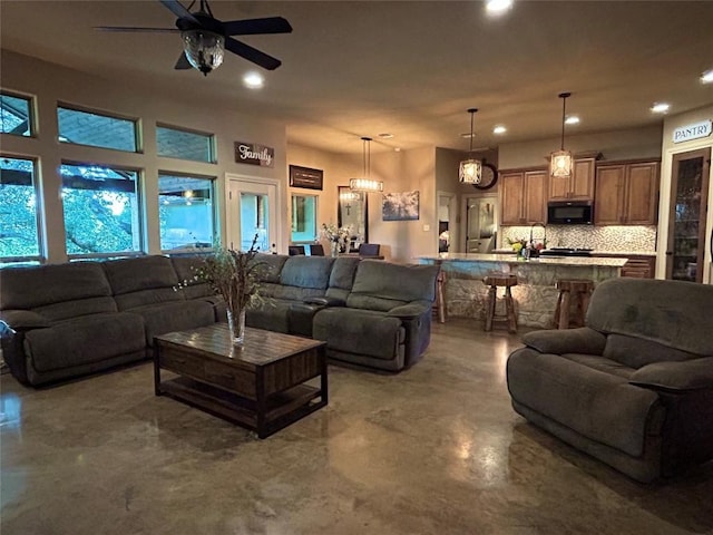 304 Bluestem Cv, Georgetown, TX 78633 - living area featuring recessed lighting and ceiling fan