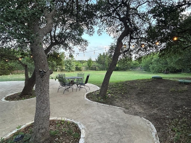 304 Bluestem Cv, Georgetown, TX 78633 - view of yard featuring a patio area and outdoor dining space