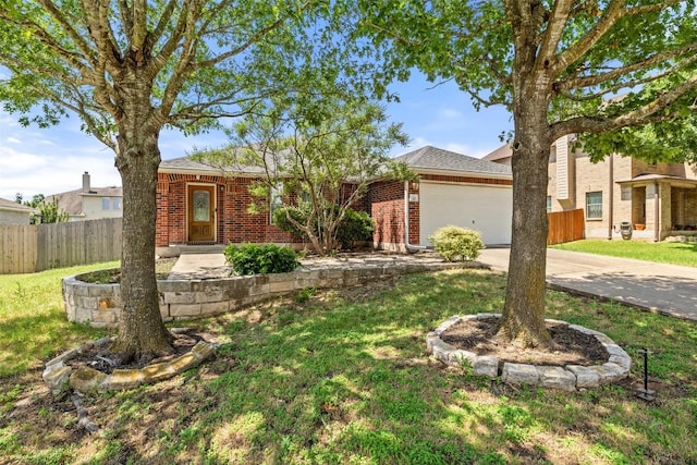 517 Castebar Dr, Round Rock, TX 78664 - view of front of house featuring concrete driveway, brick siding, and an attached garage