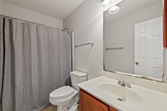517 Castebar Dr, Round Rock, TX 78664 - full bathroom with vanity, a textured wall, and a shower with shower curtain