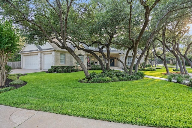 2319 Woodway Dr, Round Rock, TX 78681 - obstructed view of property with driveway and a garage