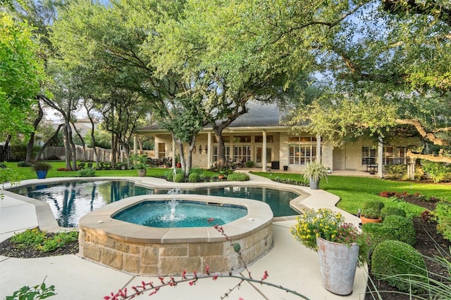 2319 Woodway Dr, Round Rock, TX 78681 - view of pool featuring a pool with connected hot tub and a patio area